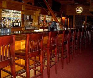 Seating at the Tavern Teak Bar